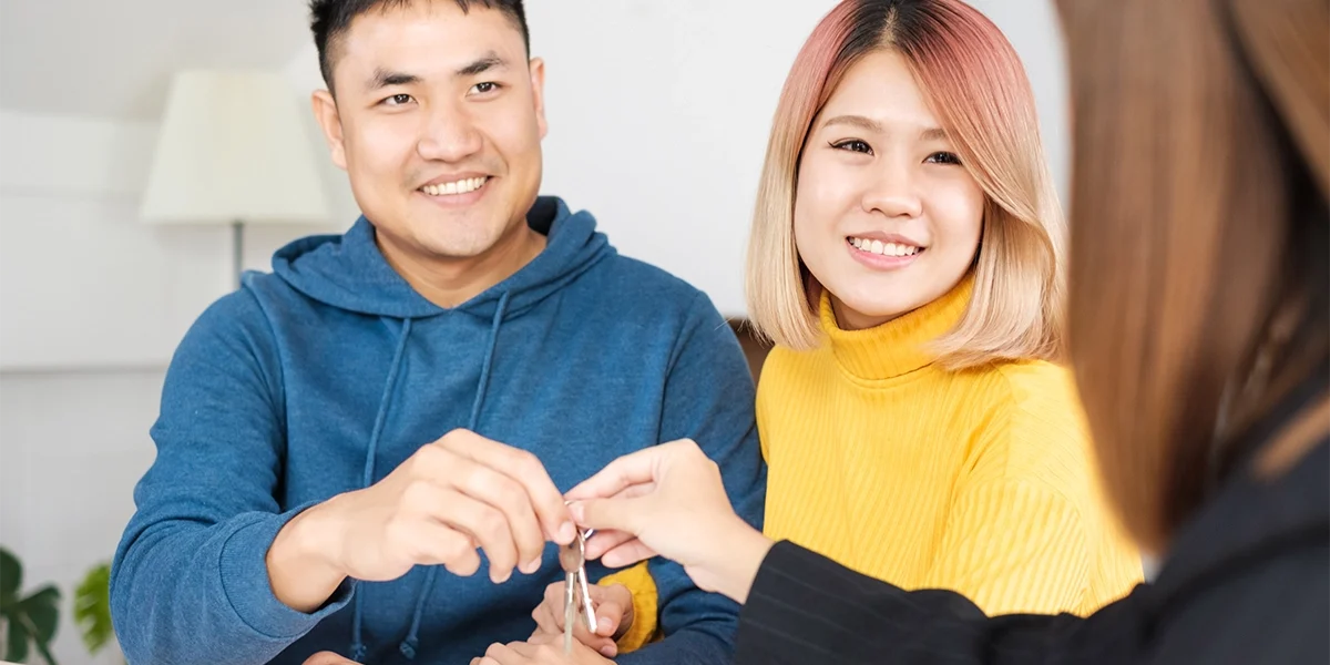 asian-happy-couple-getting-key-with-realtor-agent-2023-11-27-04-57-54-utc copy asian-happy-couple-getting-key-with-realtor-agent