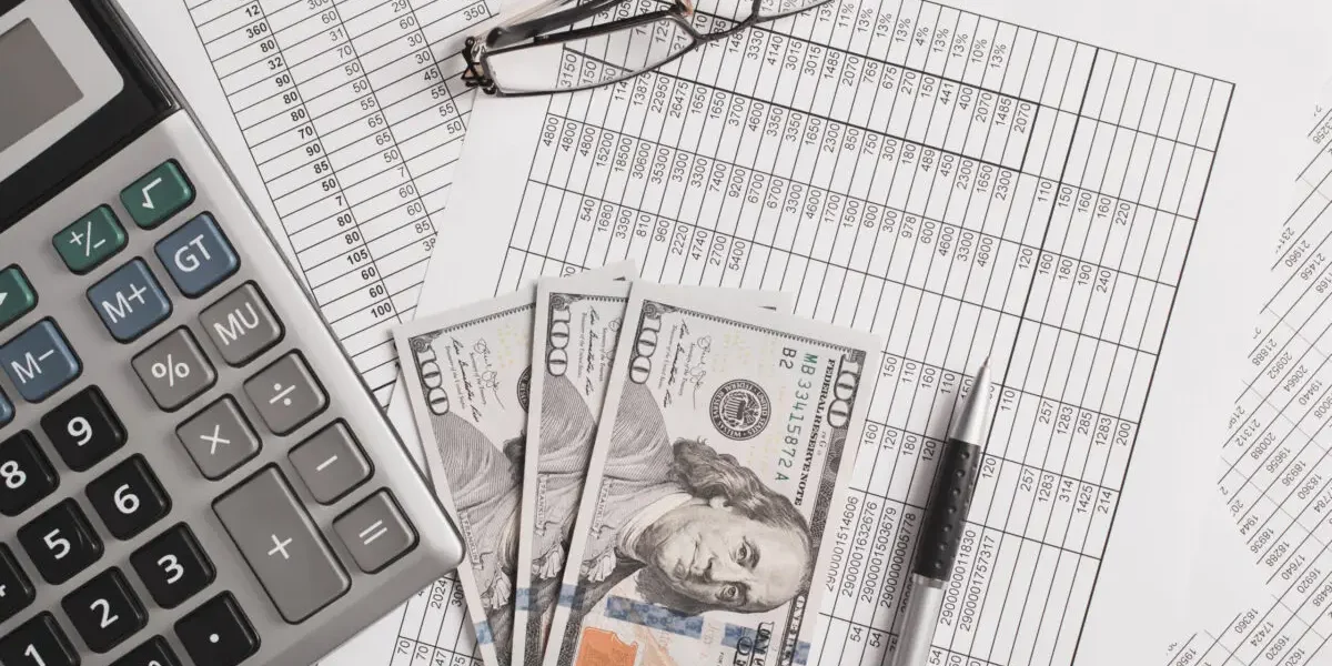 Business and finance concept. Money dollars, calculator