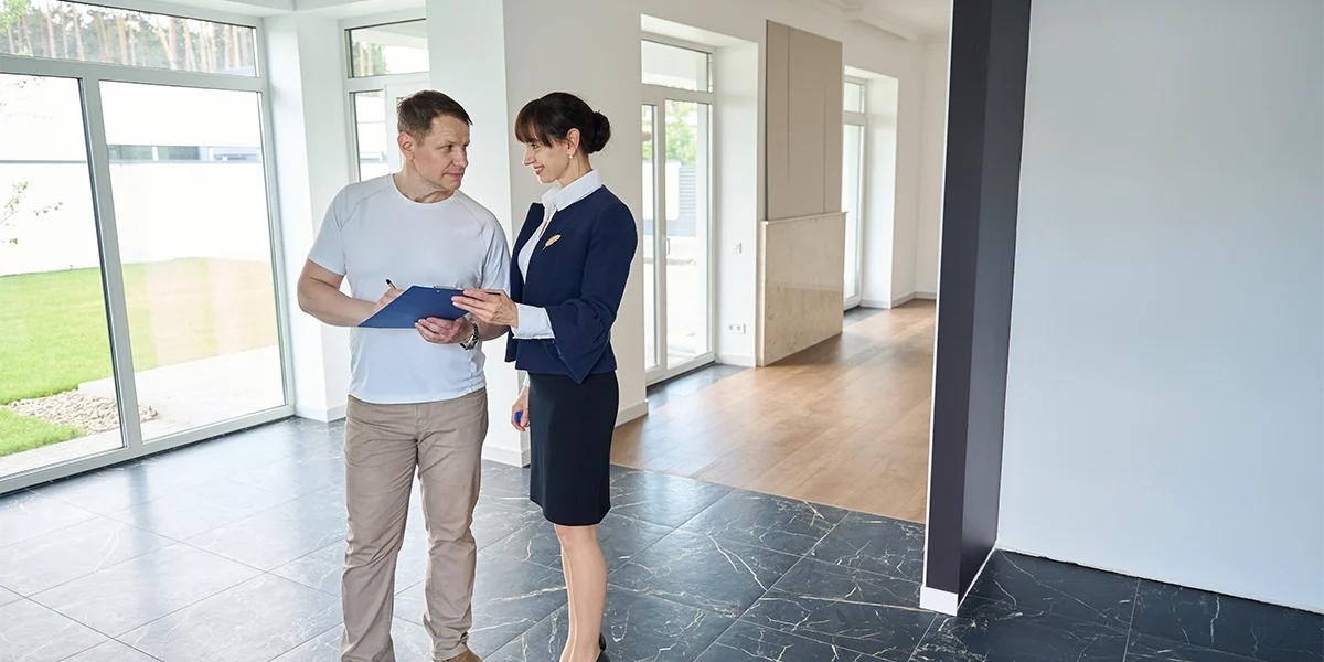 man-signs-documents-for-buying-a-house-2024-10-18-09-07-53-utc copy man-signs-documents-for-buying-a-house