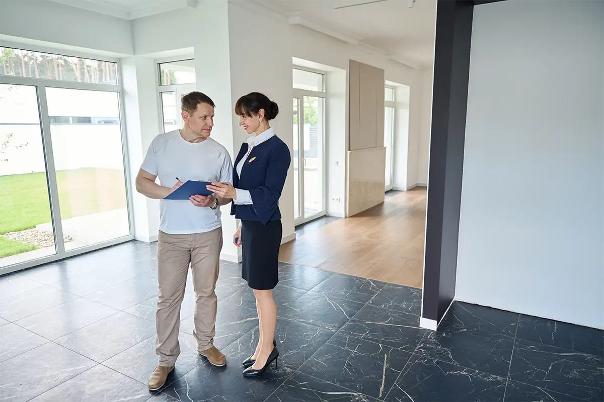 man-signs-documents-for-buying-a-house