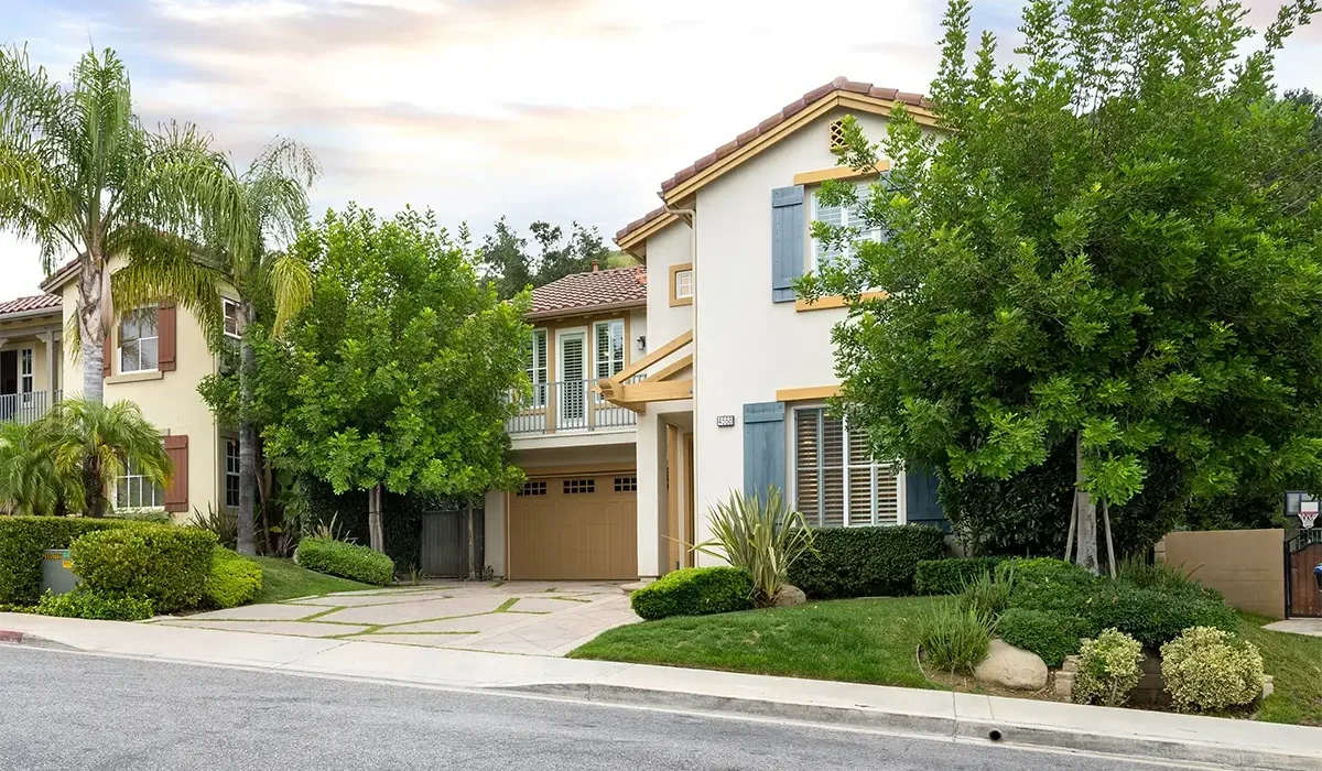 two-story-house-with-a-garage-and-front-yard
